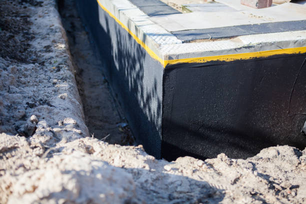 Professional Exterior Waterproofing technician working in Montevallo, AL